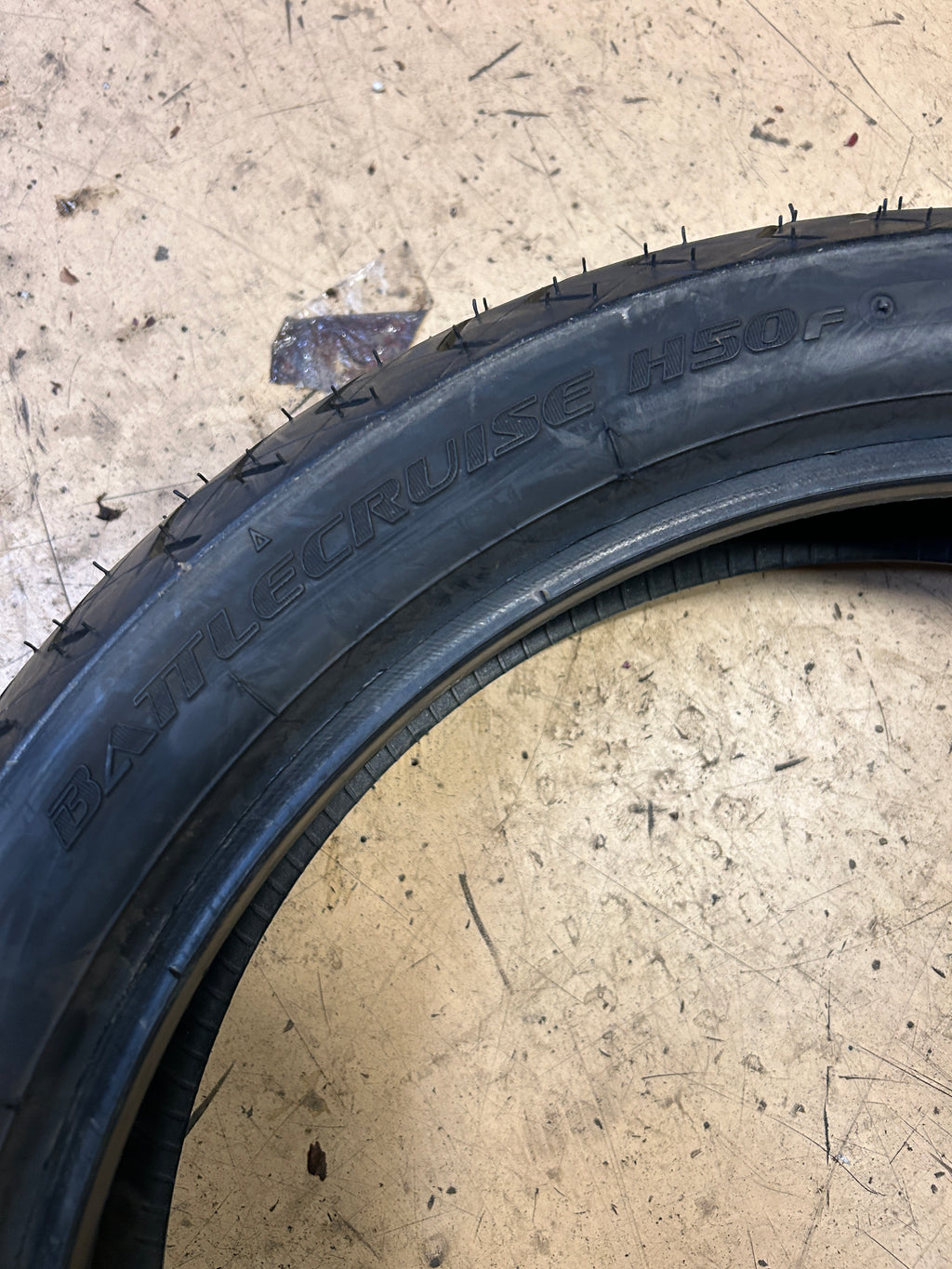 NOS BRIDGESTONE BATTLECRUISE H50F 130 70 18 63H FRONT MOTORCYCLE TIRE 7082