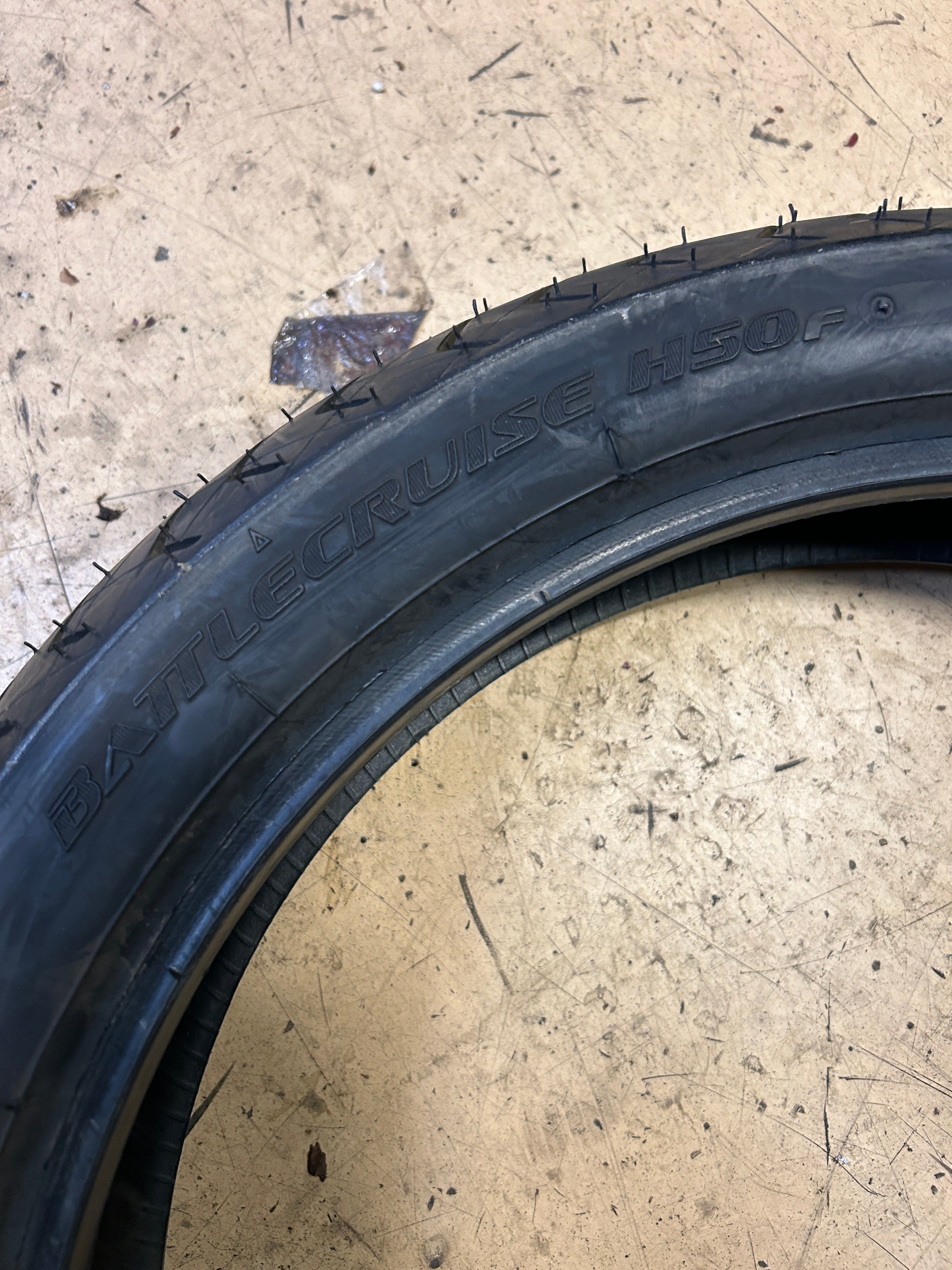 NOS BRIDGESTONE BATTLECRUISE H50F 130 70 18 63H FRONT MOTORCYCLE TIRE 7082