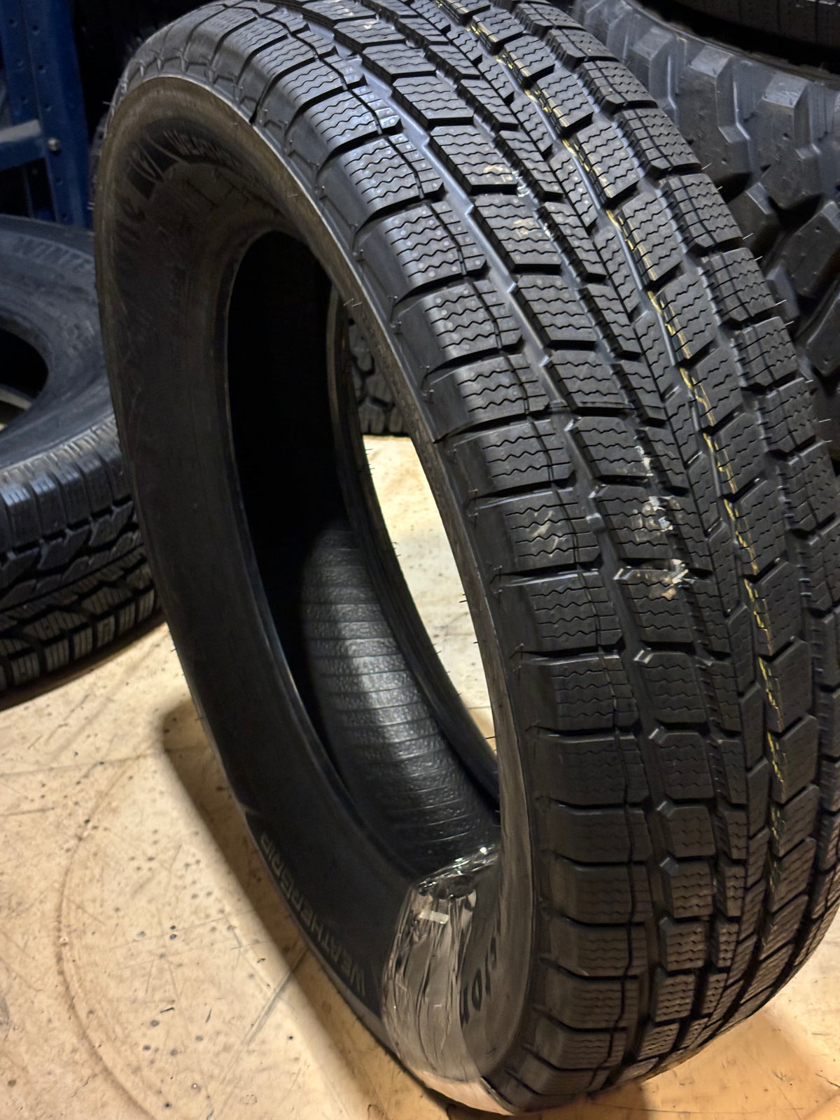 FIRESTONE WEATHERGRIP P 215 65 17 99H SL  ALL WEATHER TIRE 009170