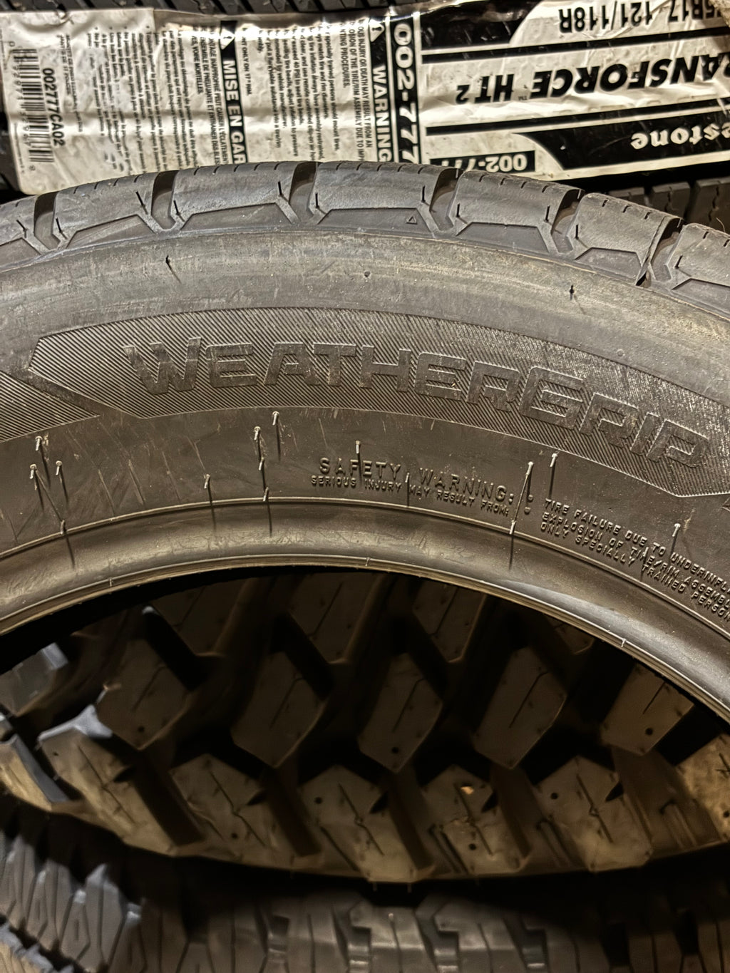 FIRESTONE WEATHERGRIP P 215 65 17 99H SL  ALL WEATHER TIRE 009170