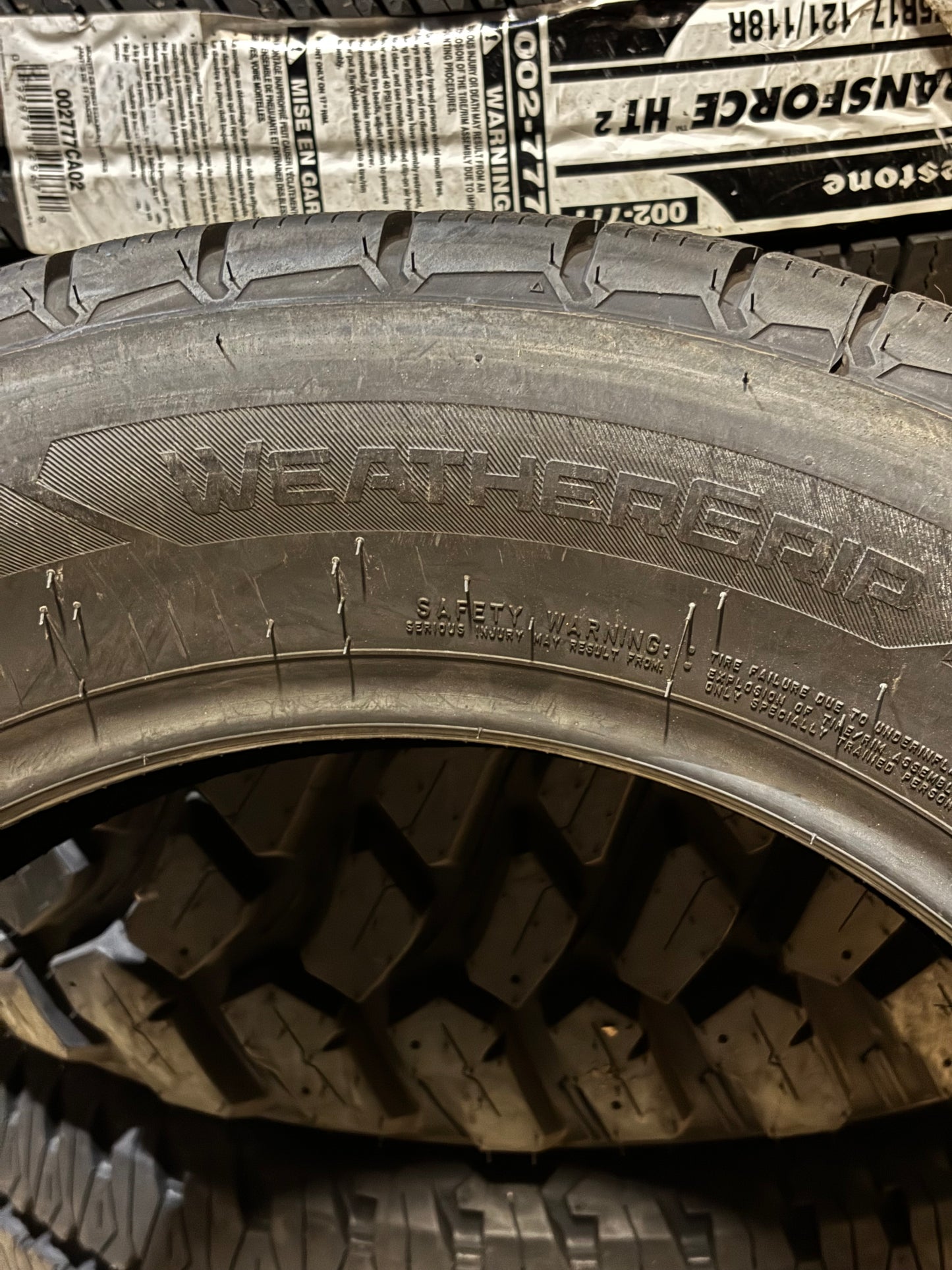 FIRESTONE WEATHERGRIP P 215 65 17 99H SL  ALL WEATHER TIRE 009170