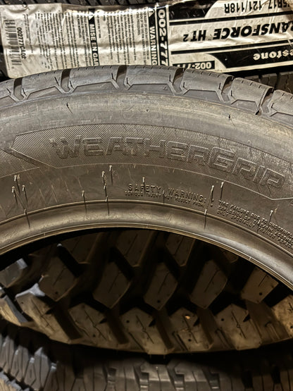 FIRESTONE WEATHERGRIP P 215 65 17 99H SL  ALL WEATHER TIRE 009170
