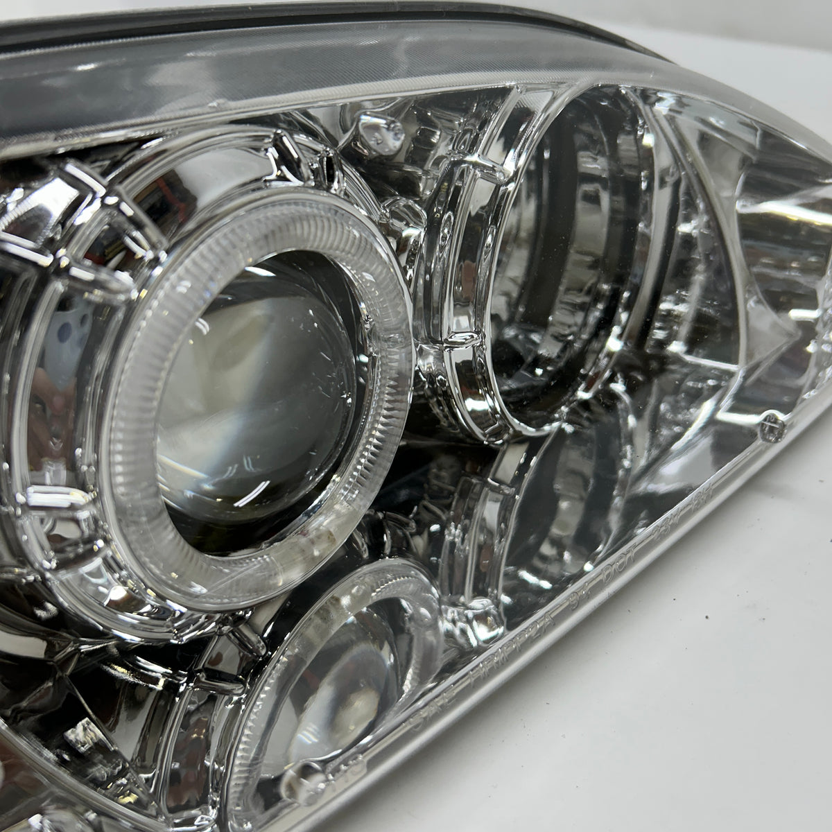 ANZOUSA FORD MUSTANG '94-'98 PROJECTOR HEADLIGHTS WITH HALO CHROME PAIR  121039