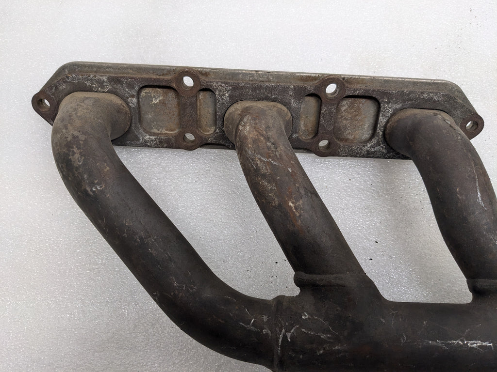 USED PORSCHE BOXSTER EXHAUST MANIFOLD LEFT 99611110106