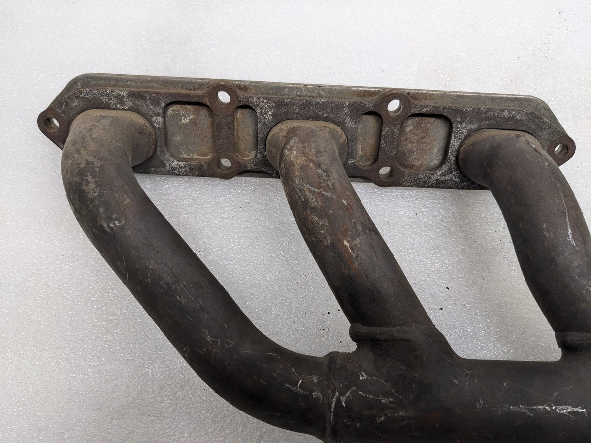 USED PORSCHE BOXSTER EXHAUST MANIFOLD LEFT 99611110106