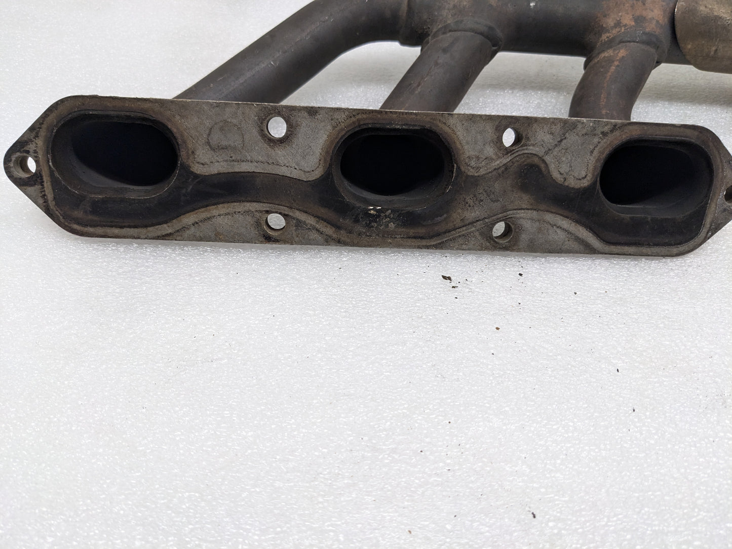 USED PORSCHE BOXSTER EXHAUST MANIFOLD LEFT 99611110106