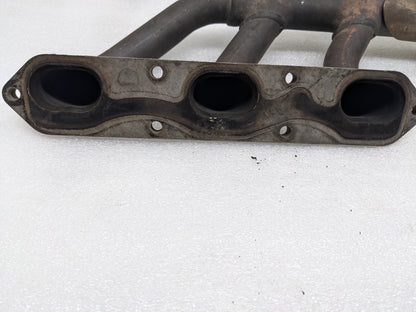 USED PORSCHE BOXSTER EXHAUST MANIFOLD LEFT 99611110106