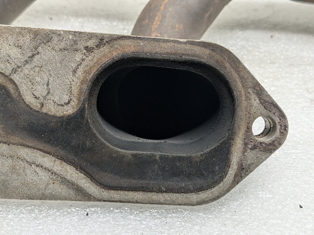 USED PORSCHE BOXSTER EXHAUST MANIFOLD LEFT 99611110106