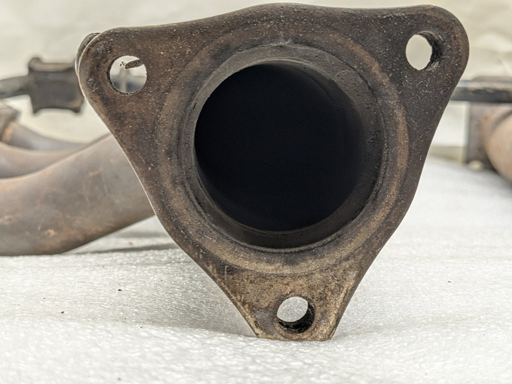 USED PORSCHE BOXSTER EXHAUST MANIFOLD LEFT 99611110106