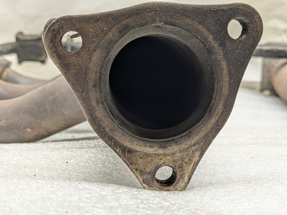 USED PORSCHE BOXSTER EXHAUST MANIFOLD LEFT 99611110106