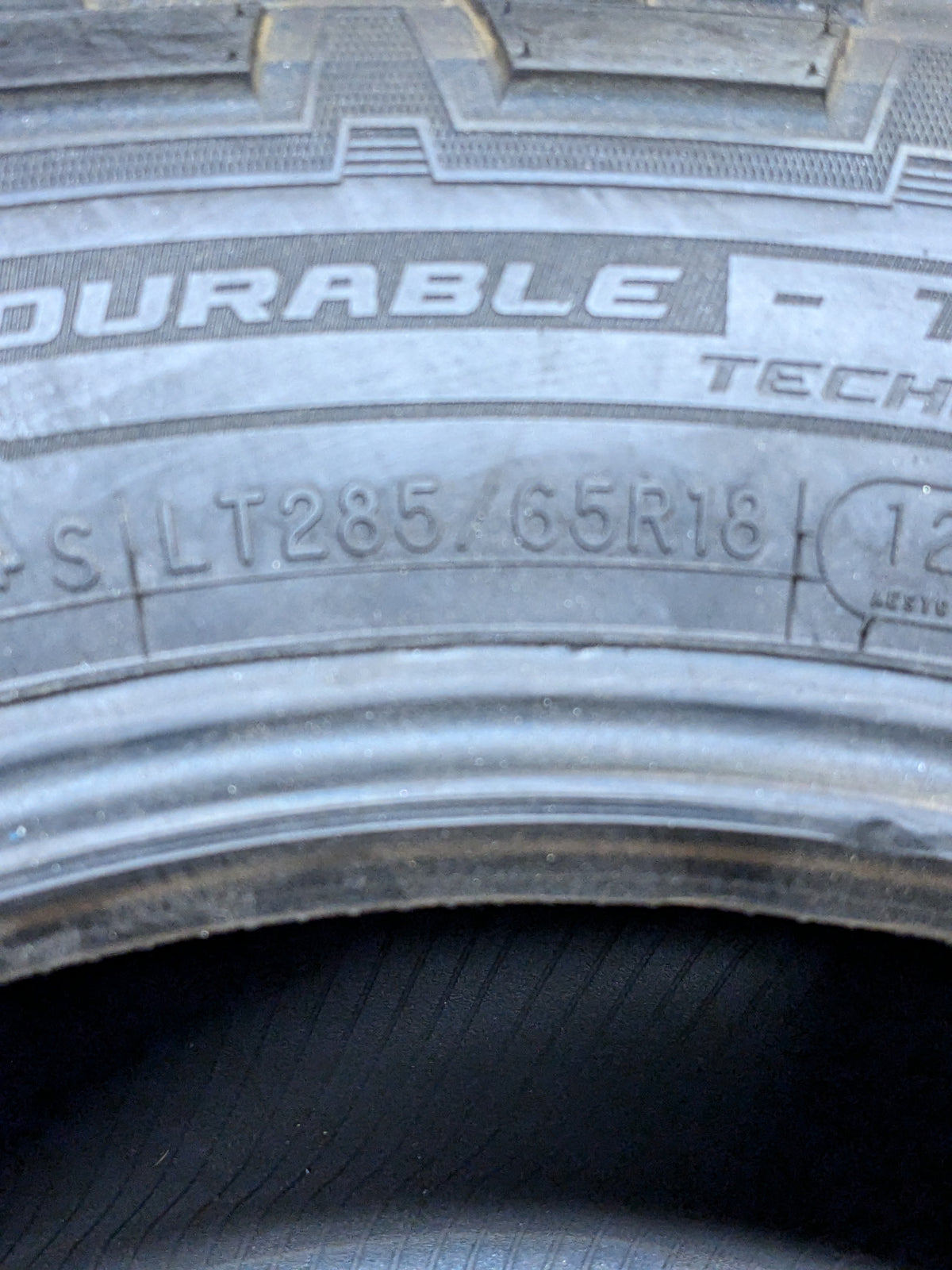 COOPER DISCOVERER AT3 XLT WL LT 285 65 18 125/122S LRE 10PLY ALL TERRAIN TIRE 90000032603