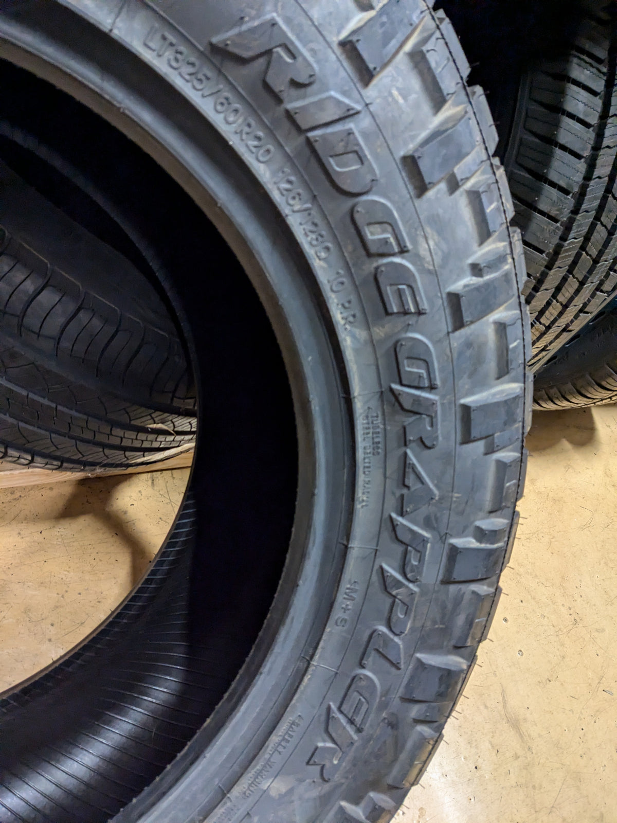 NOS NITTO RIDGE GRAPPLER BSW LT 325 60 20 126/123Q E ALL TERRAIN TIRE 217440