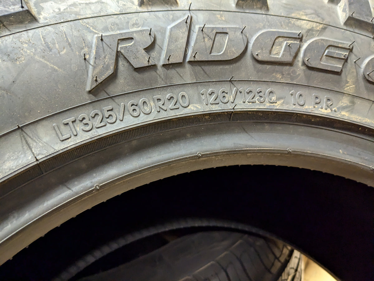 NOS NITTO RIDGE GRAPPLER BSW LT 325 60 20 126/123Q E ALL TERRAIN TIRE 217440