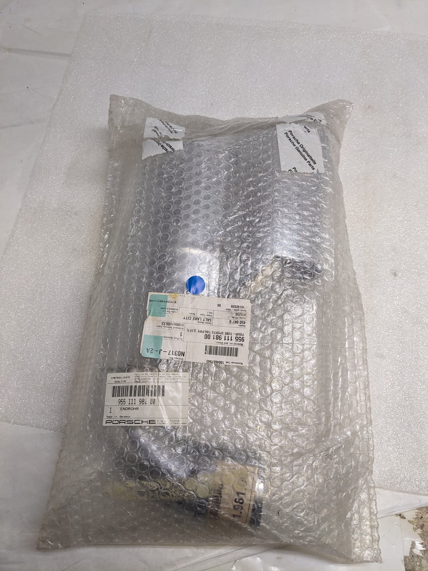 PORSCHE 95511198100 EXHAUST TAIL PIPE TIP FOR 2003-2006 CAYENNE LEFT NEW R21