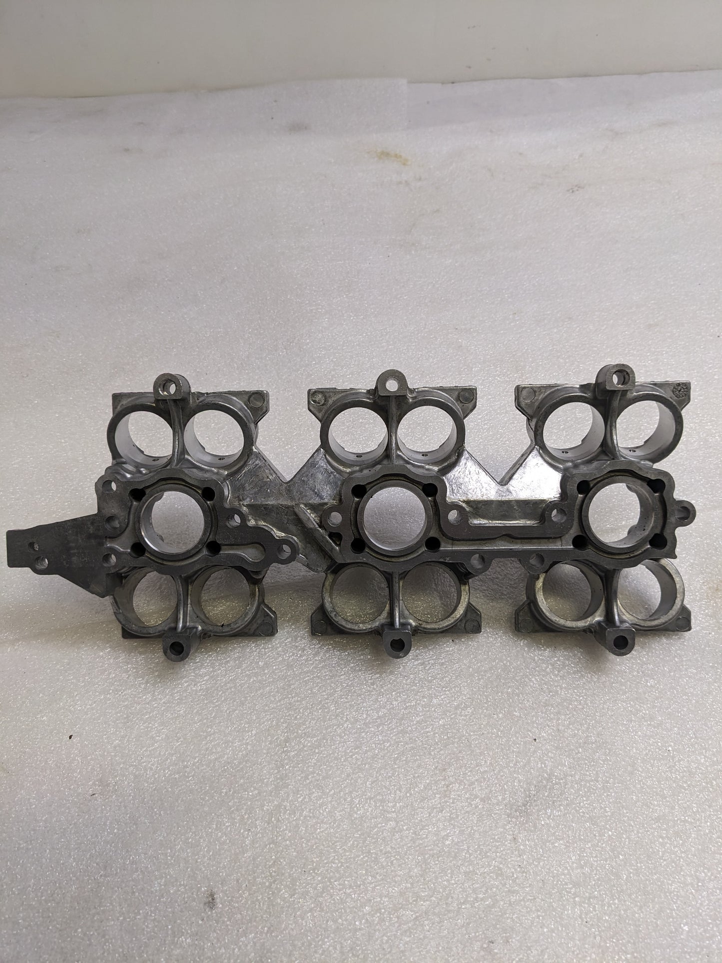 PORSCHE 9961041058R CAMSHAFT FOLLOWER HOUSING FOR 1999-2001 BOXSTER/911 USED R14