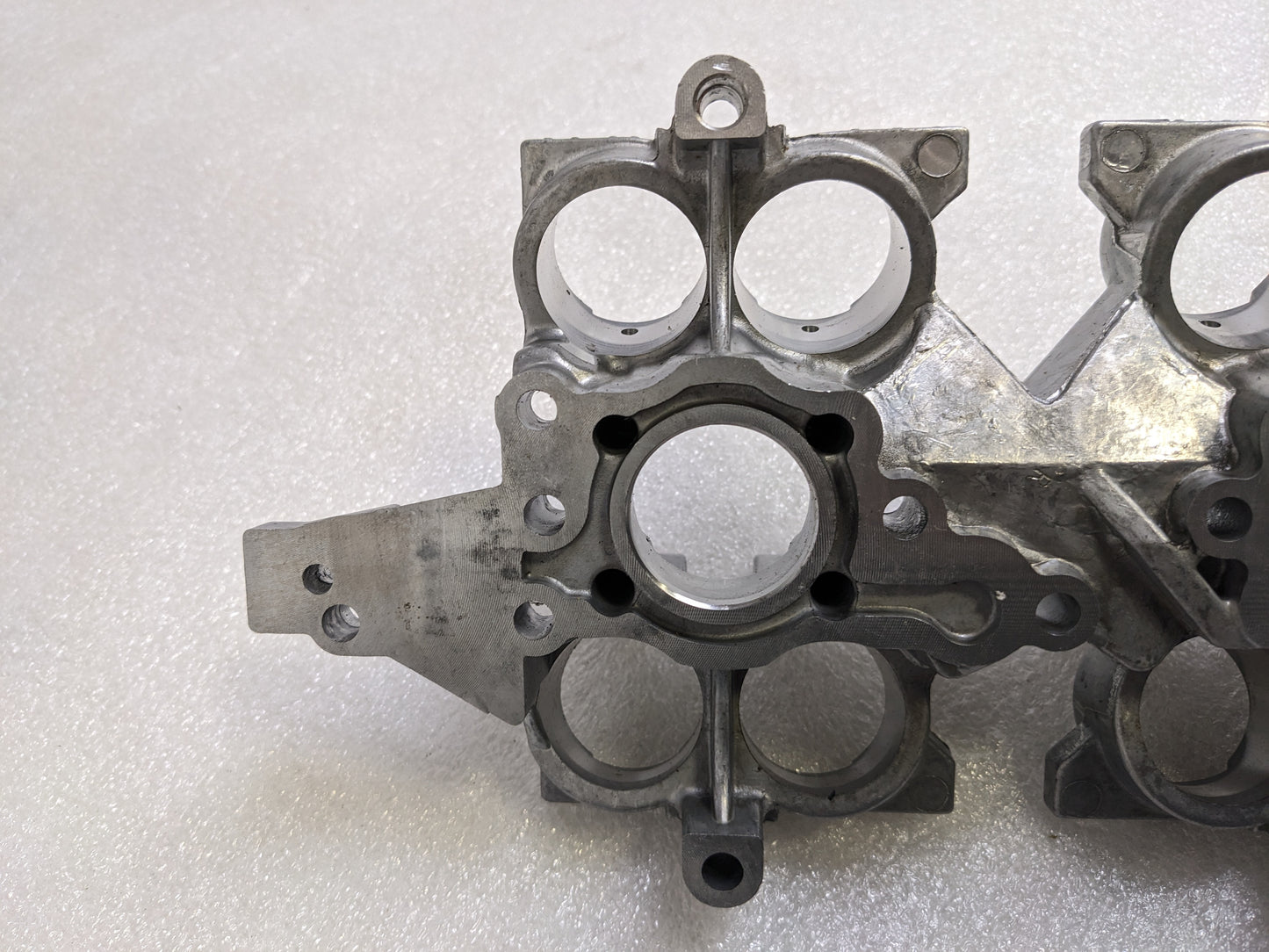 PORSCHE 9961041058R CAMSHAFT FOLLOWER HOUSING FOR 1999-2001 BOXSTER/911 USED R14