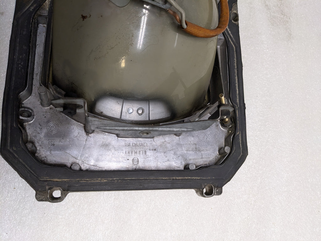 BOSCH 0301056107 LEFT HEADLIGHT HOUSING FOR 1972-1980 MERCEDES-BENZ S-CLASS W116 USED SRI