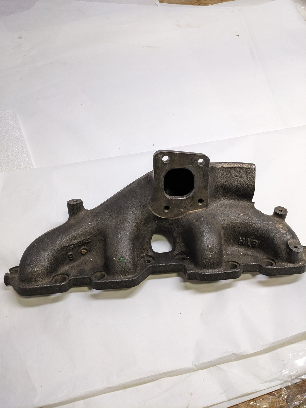 ISUZU NQR-70 EXHAUST MANIFOLD NEW R14