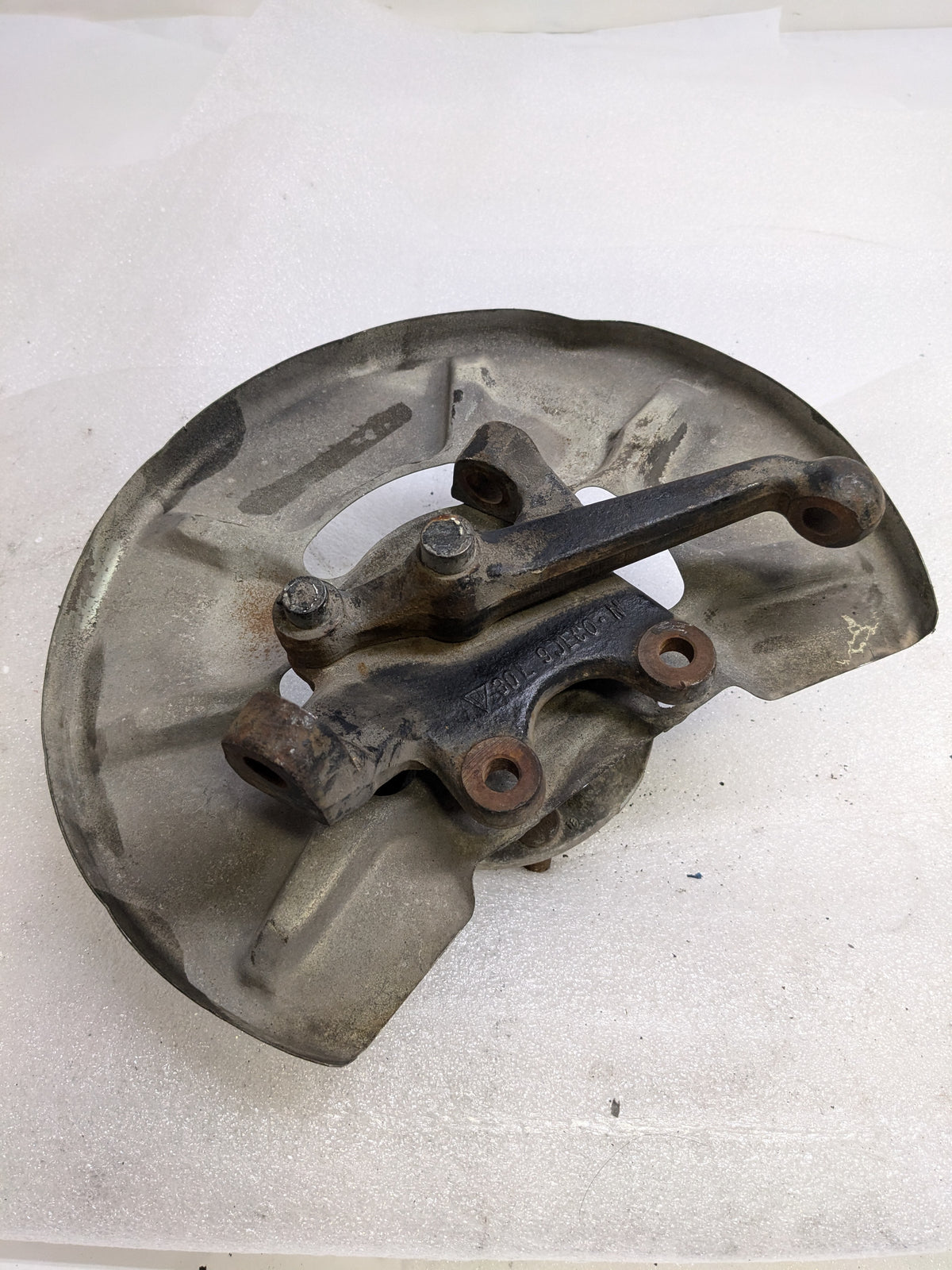 PORSCHE 94434165506 LEFT STEERING KNUCKLE AND DUST SHIELD FOR 1987-1991 944 USED #1 PG2