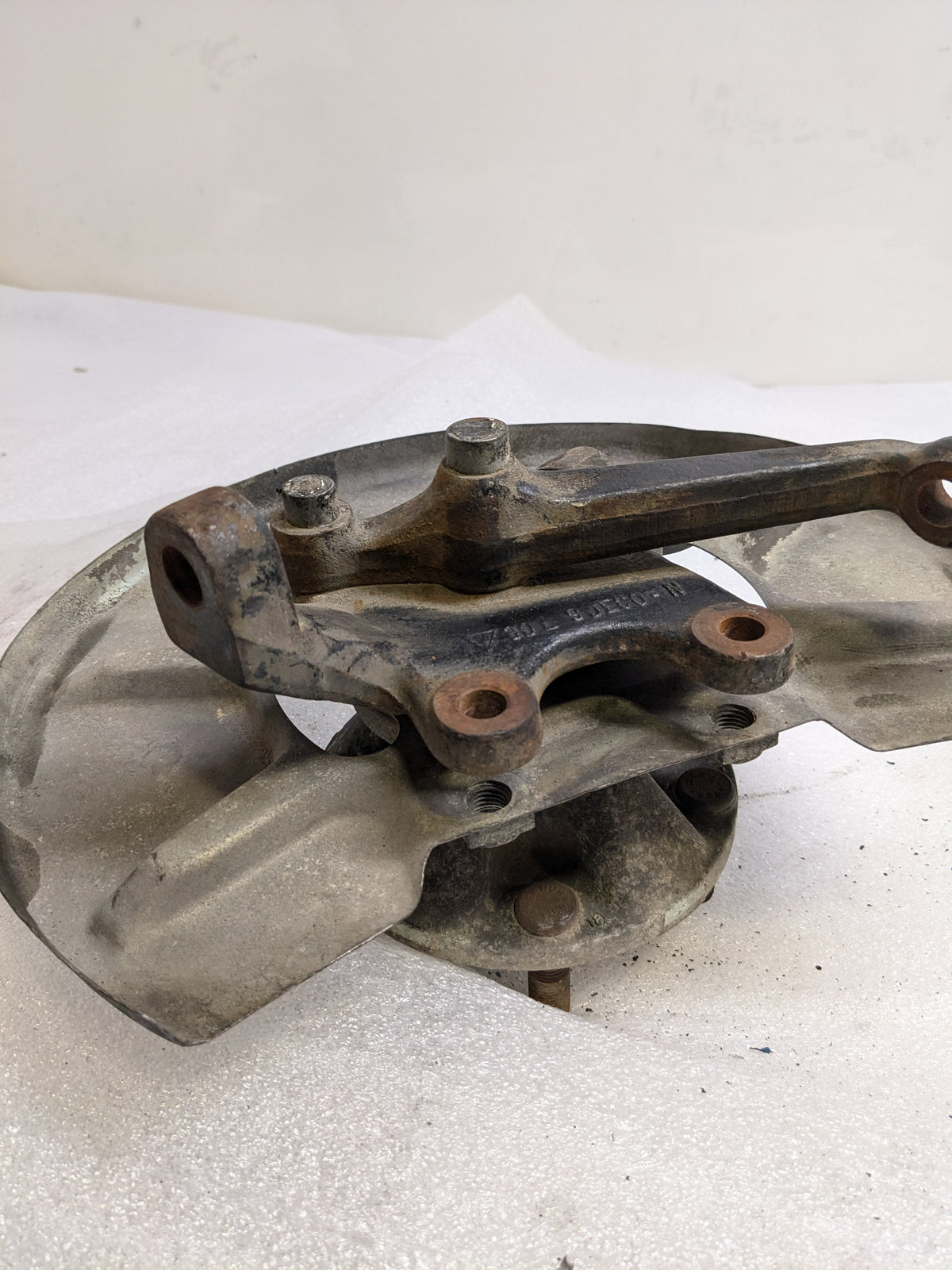 PORSCHE 94434165506 LEFT STEERING KNUCKLE AND DUST SHIELD FOR 1987-1991 944 USED #1 PG2
