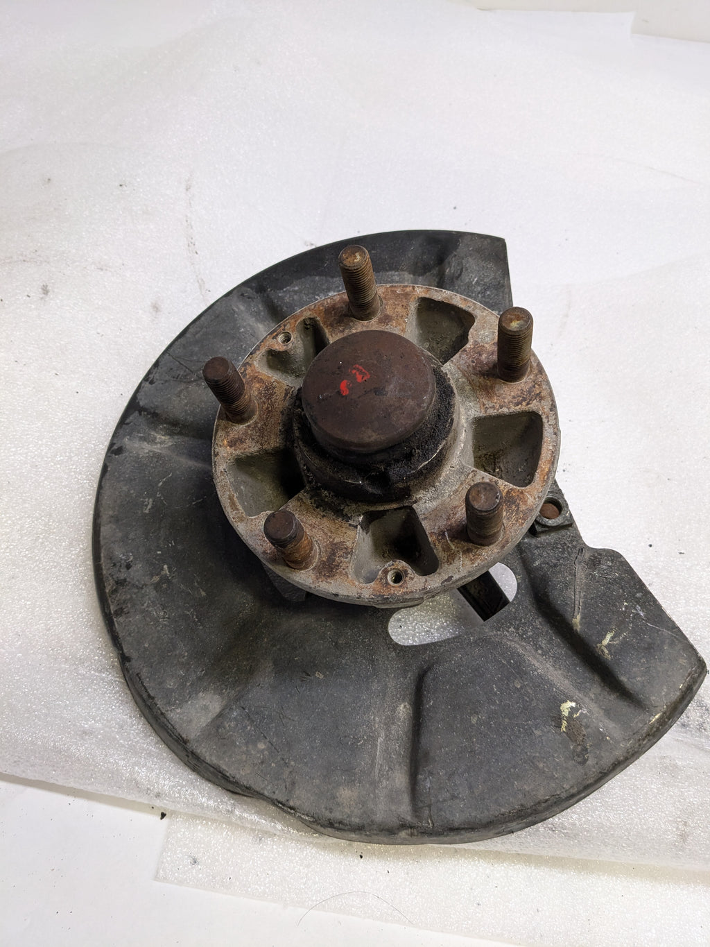 PORSCHE 94434165506 LEFT STEERING KNUCKLE AND DUST SHIELD FOR 1987-1991 944 USED #1 PG2