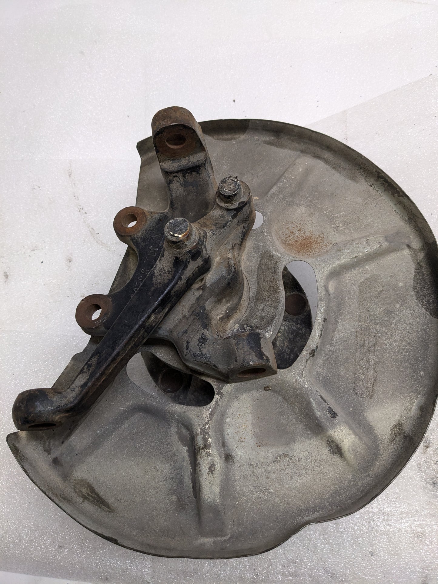 PORSCHE 94434165506 LEFT STEERING KNUCKLE AND DUST SHIELD FOR 1987-1991 944 USED #1 PG2