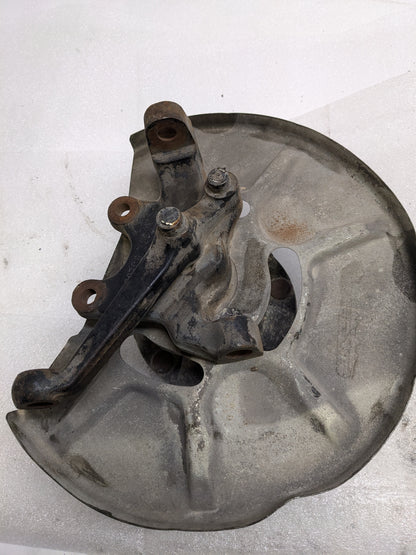 PORSCHE 94434165506 LEFT STEERING KNUCKLE AND DUST SHIELD FOR 1987-1991 944 USED #1 PG2