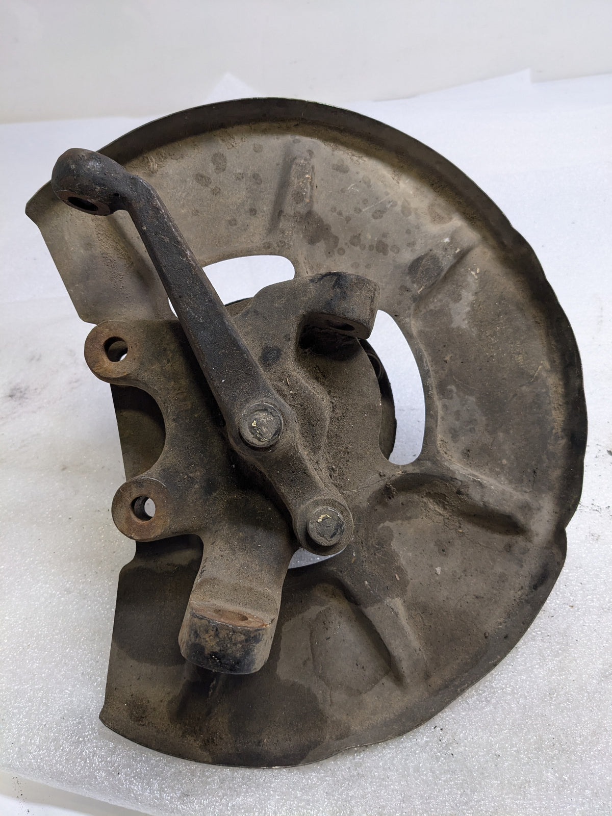 PORSCHE 94434165506 LEFT STEERING KNUCKLE AND DUST SHIELD FOR 1987-1991 944 USED #2 PG2