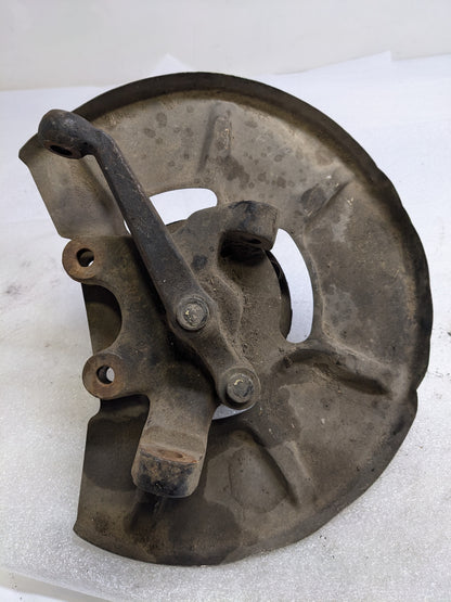 PORSCHE 94434165506 LEFT STEERING KNUCKLE AND DUST SHIELD FOR 1987-1991 944 USED #2 PG2