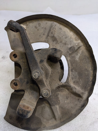 PORSCHE 94434165506 LEFT STEERING KNUCKLE AND DUST SHIELD FOR 1987-1991 944 USED #2 PG2