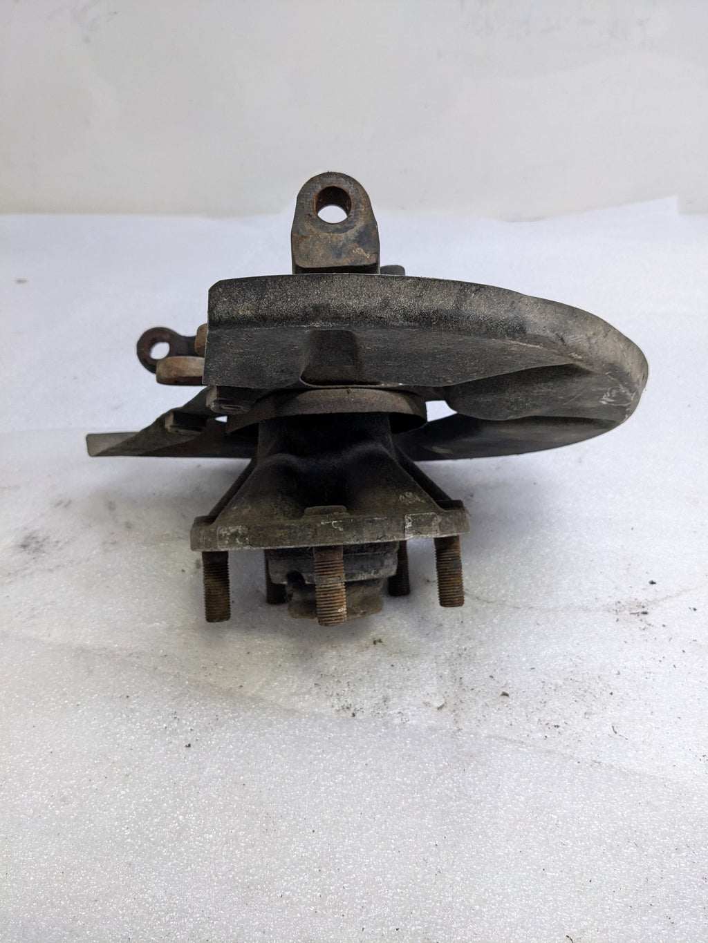 PORSCHE 94434165506 LEFT STEERING KNUCKLE AND DUST SHIELD FOR 1987-1991 944 USED #2 PG2