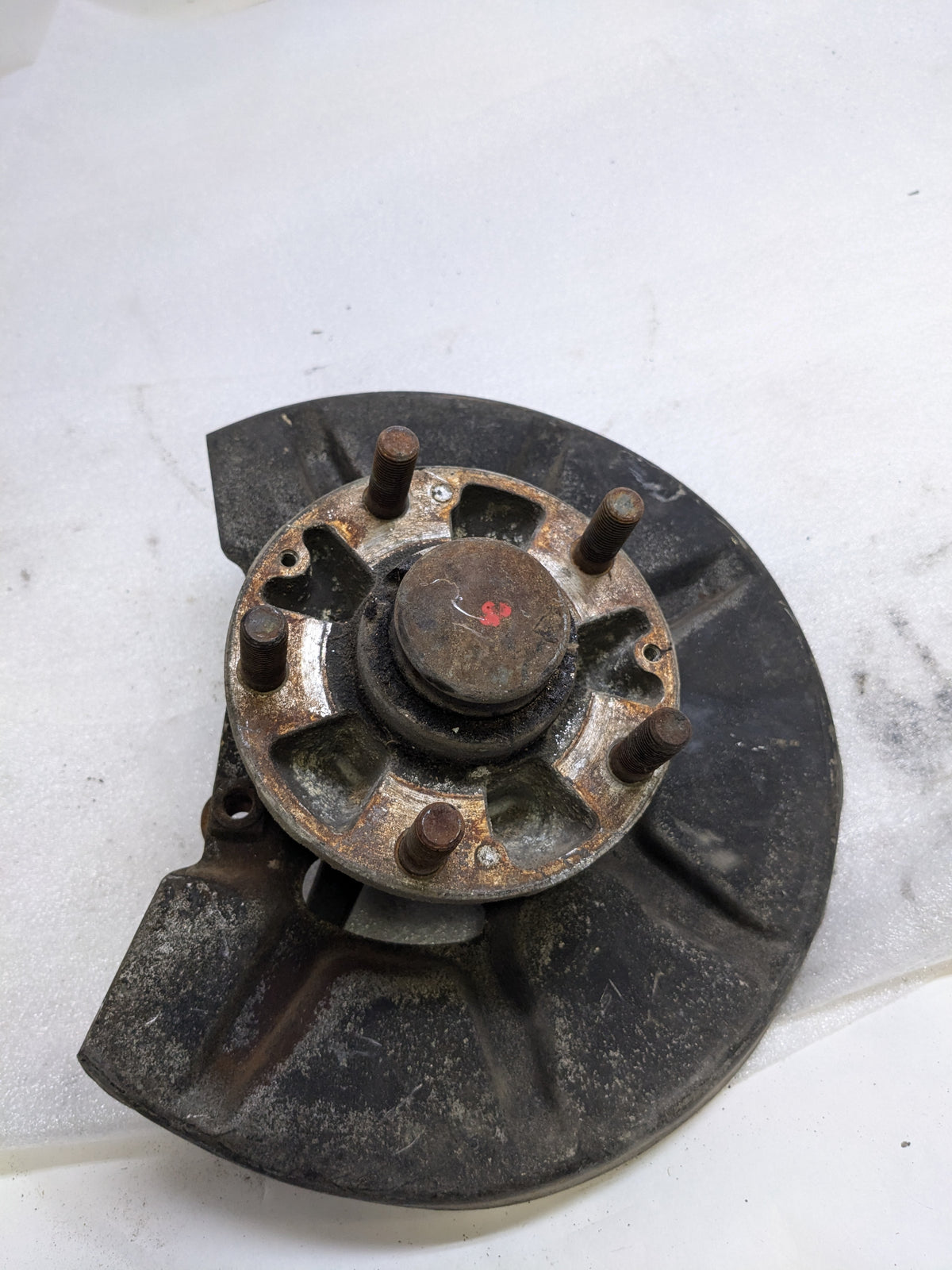 PORSCHE 94434165506 LEFT STEERING KNUCKLE AND DUST SHIELD FOR 1987-1991 944 USED #2 PG2