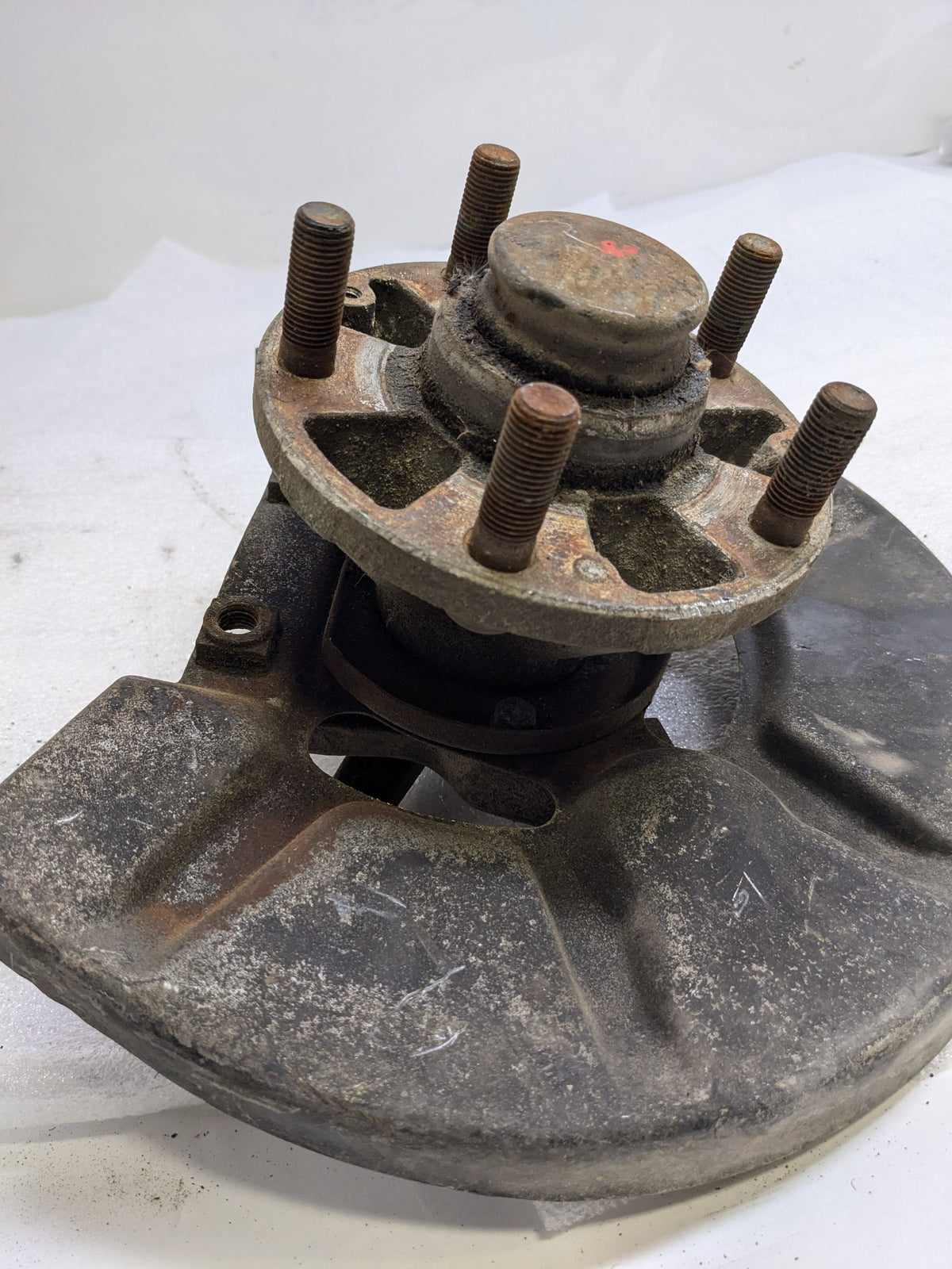 PORSCHE 94434165506 LEFT STEERING KNUCKLE AND DUST SHIELD FOR 1987-1991 944 USED #2 PG2