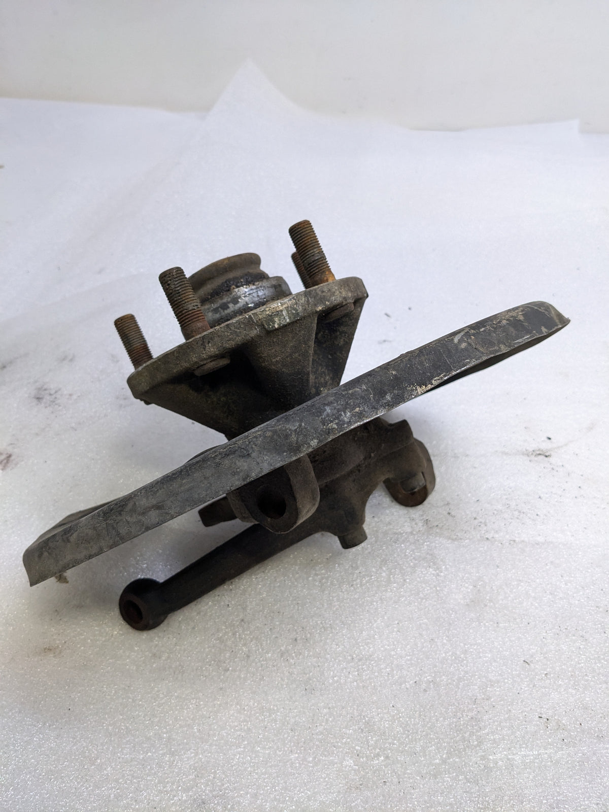 PORSCHE 94434165506 LEFT STEERING KNUCKLE AND DUST SHIELD FOR 1987-1991 944 USED #2 PG2