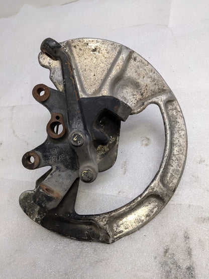 PORSCHE 92835108400/92834105714 LEFT STERRING KNUCKLE AND BRAKE PROT PLATE FOR 1986 928 S USED PG2
