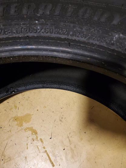 USED 12/32'' GOODYEAR WRANGLER TERRITORY AT LT 265 60 22 123/120S 10PLY TIRE 733295838