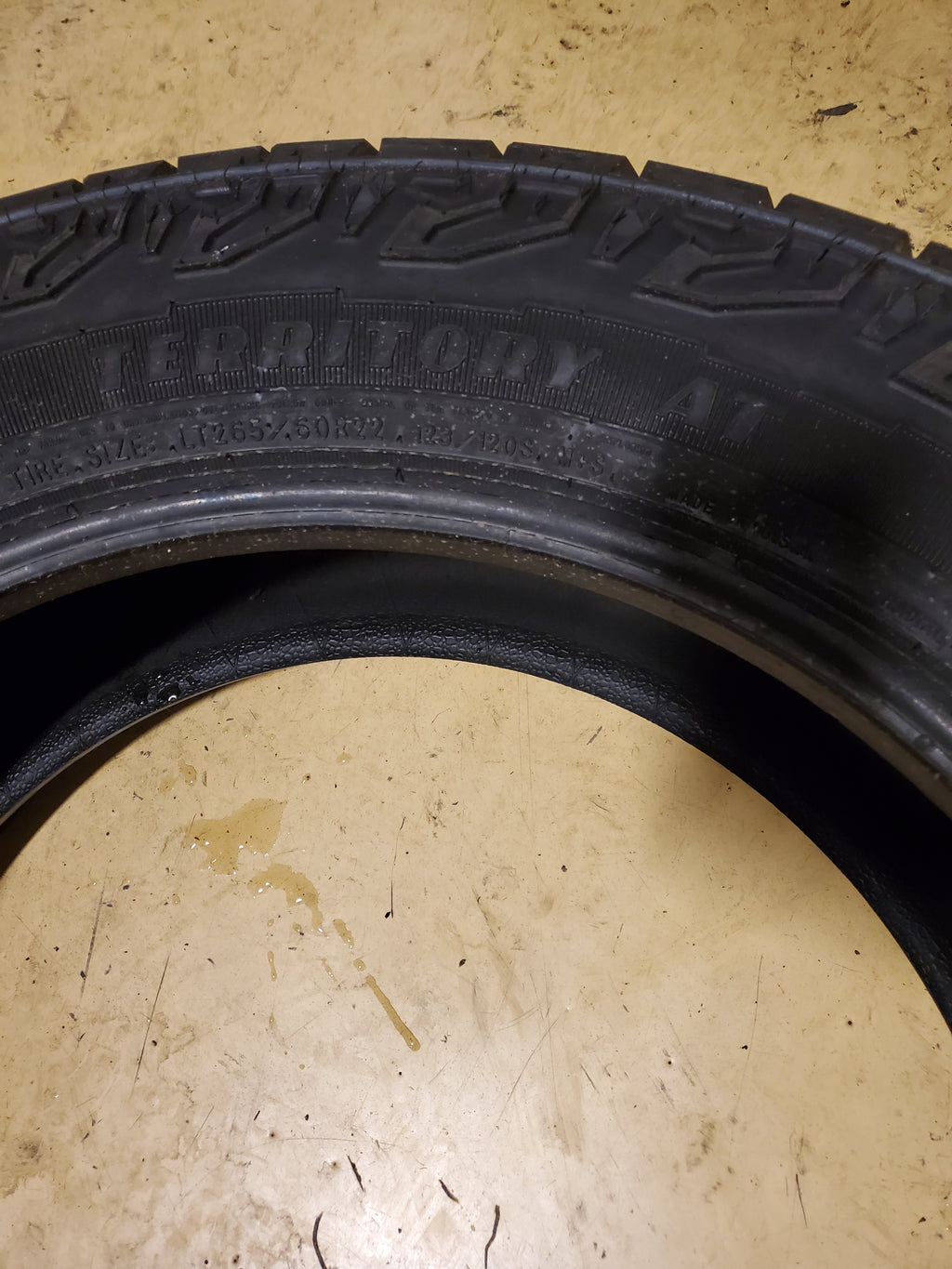 USED 12/32'' GOODYEAR WRANGLER TERRITORY AT LT 265 60 22 123/120S 10PLY TIRE 733295838