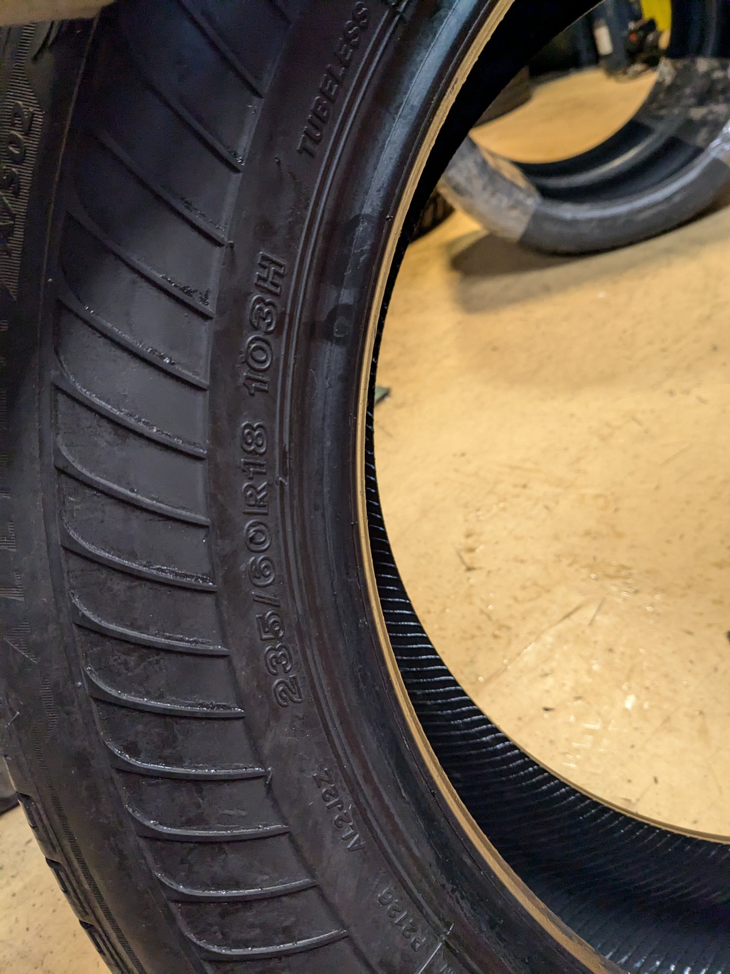 USED 7/32” OF 8/32” BRIDGESTONE ALENZA A/S 02 RUNFLAT P 235 60 18 103H SL ALL SEASON TIRE 012165
