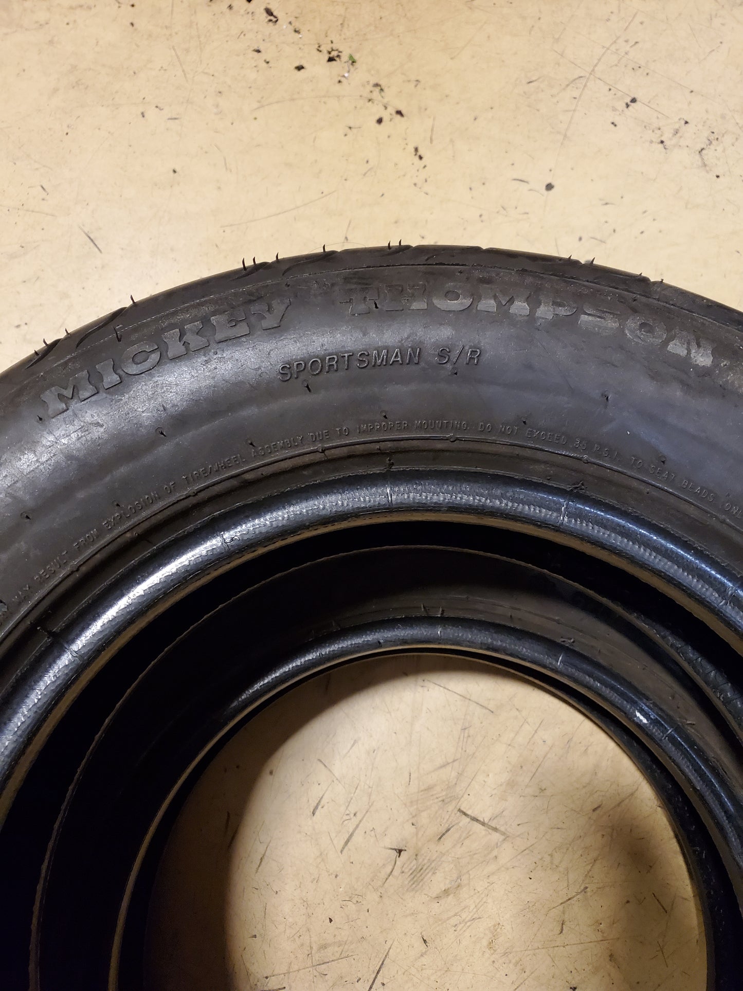 6/32” USED MICKEY THOMPSON SPORTSMAN S/R BSW LT 26 6 15 80H TRACK TIRE 321039004