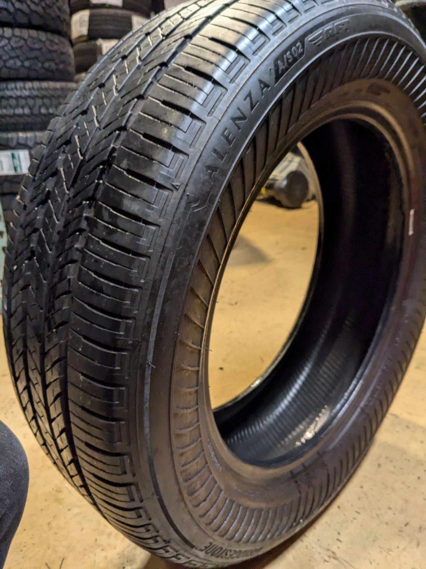 USED 7/32” OF 8/32” BRIDGESTONE ALENZA A/S 02 RUNFLAT P 235 60 18 103H SL ALL SEASON TIRE 012165