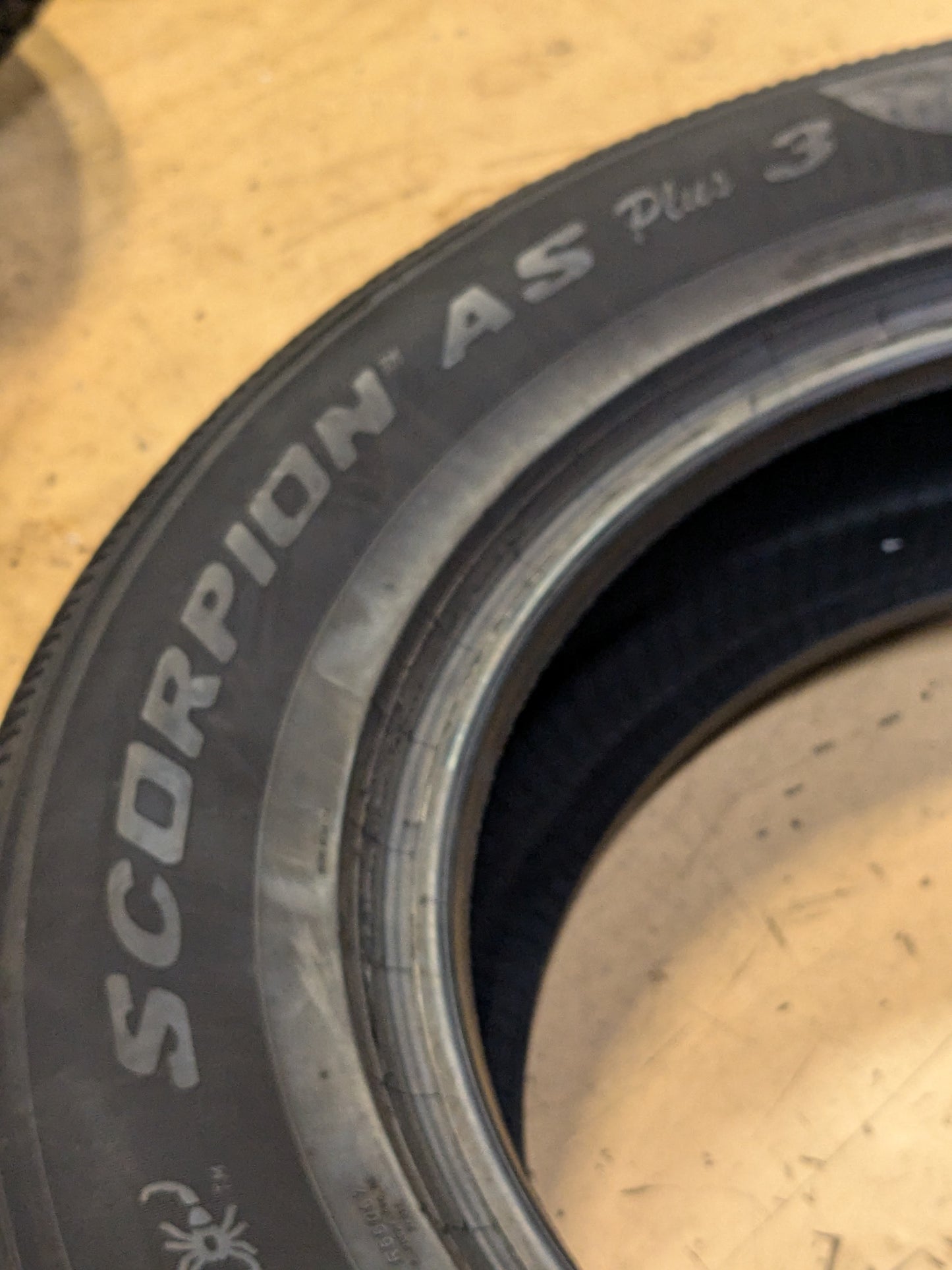 USED 11/32" OF 12/32" PIRELLI SCORPION ALL SEASON PLUS 3 P 265 60 18 110V SL ALL SEASON TIRE 3918700