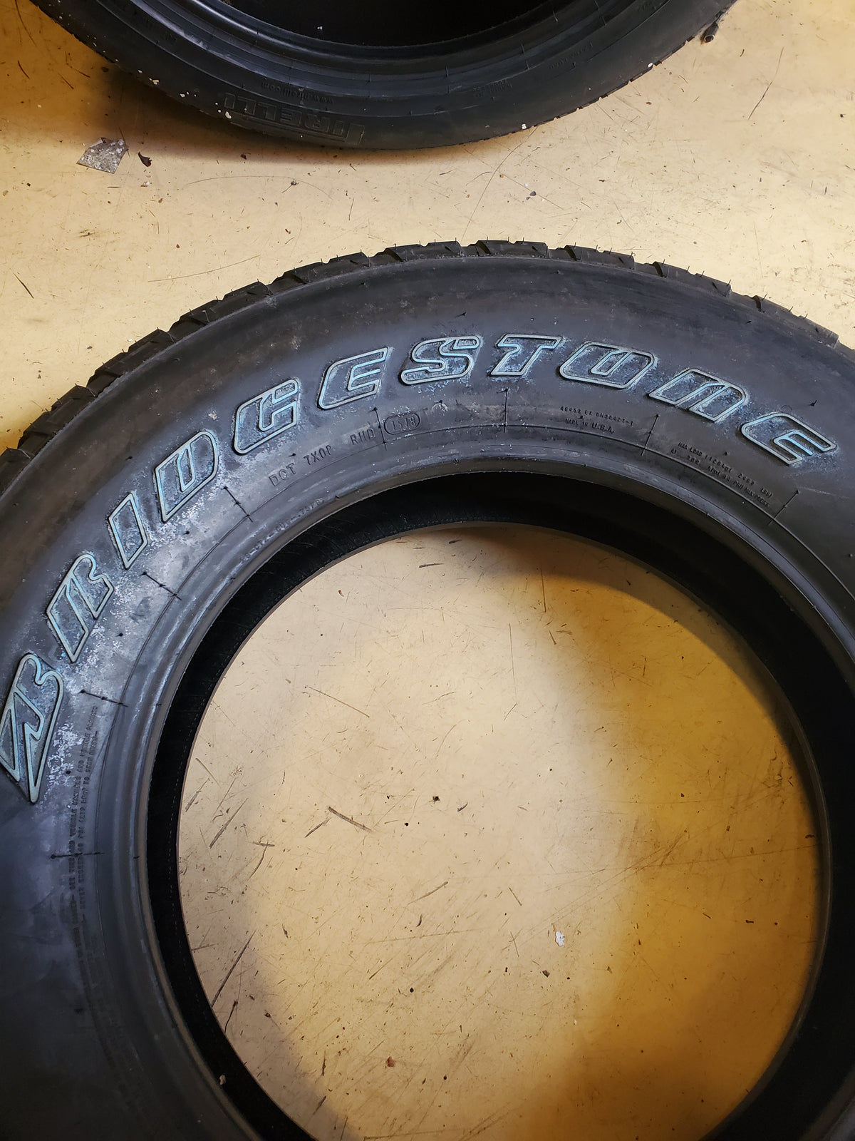 NOS BRIDGESTONE DUELER A/T RH-S OWL P 255 70 18 112S ALL TERRAIN TIRE 057945