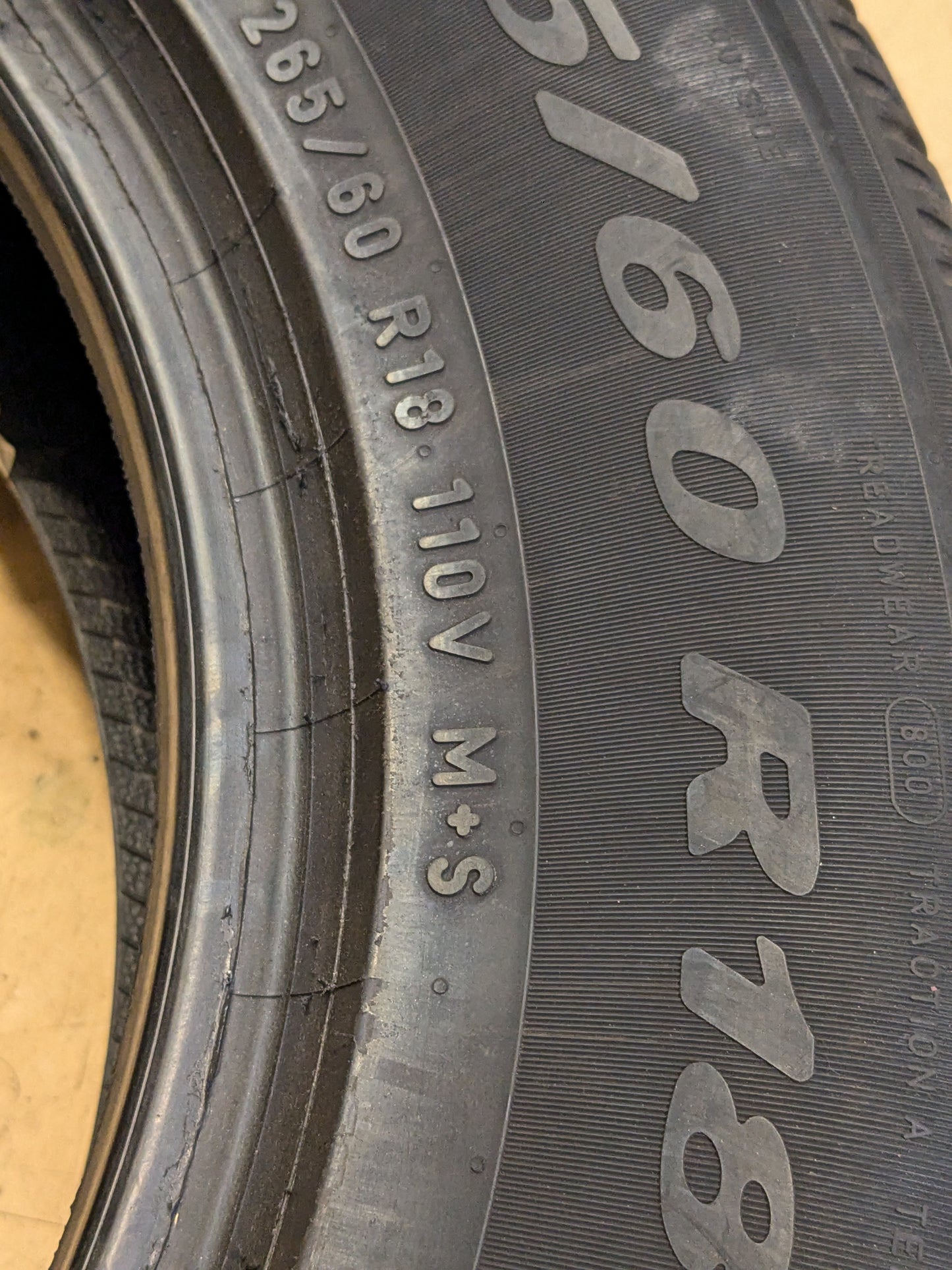 USED 11/32" OF 12/32" PIRELLI SCORPION ALL SEASON PLUS 3 P 265 60 18 110V SL ALL SEASON TIRE 3918700