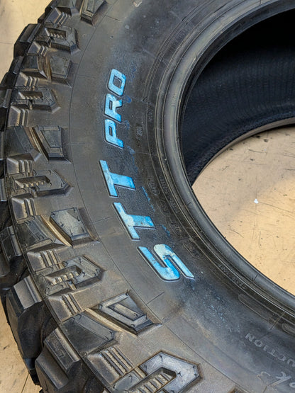 NOS COOPER DISCOVERER STT PRO RWL LT 325 65 18 127/124Q LRE 10 PLY MUD TERRAIN TIRE 170124034