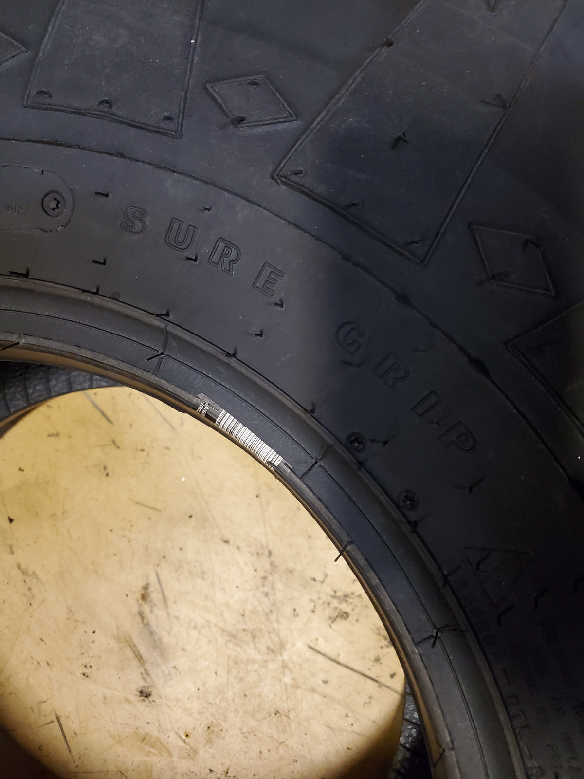 GOODYEAR SURE GRIP BSW 12.5L 15SL 12PLY TRACTOR TIRE 4TG305