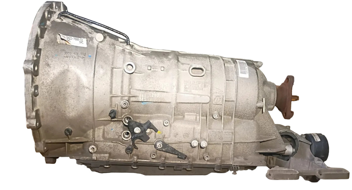 USED TRANSMISSION ASSY. 10-12 XF XJ 5.0 AUTOMATIC 9X23-7000-CE