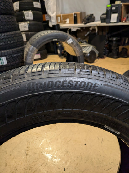 USED 7/32” OF 8/32” BRIDGESTONE ALENZA A/S 02 RUNFLAT P 235 60 18 103H SL ALL SEASON TIRE 012165