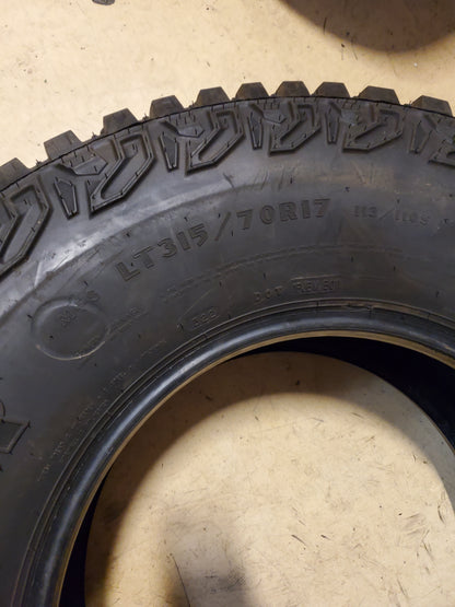 USED 14/32" GOODYEAR TERRITORY MT LT 315 70 17 113/110S 6PLY MUD TIRE 796270833